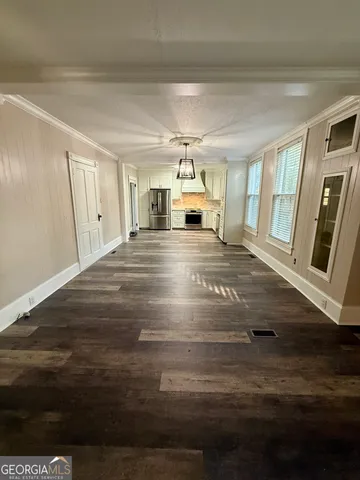 a bathroom with a sink vanity and a mirror