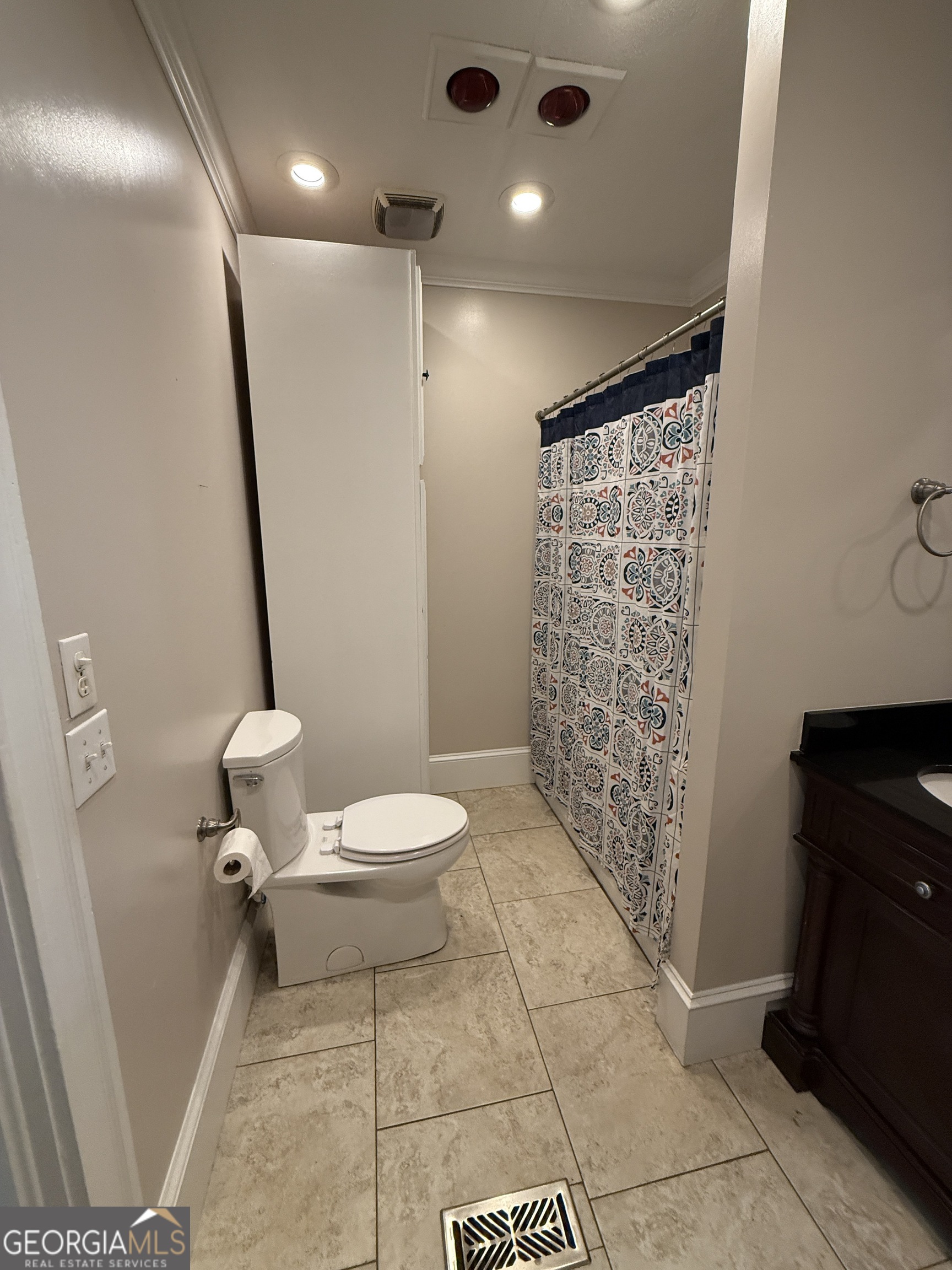 646 McLendon Street Ashburn, GA 31714 - Photo 44 of 63 a bathroom with a toilet and a shower