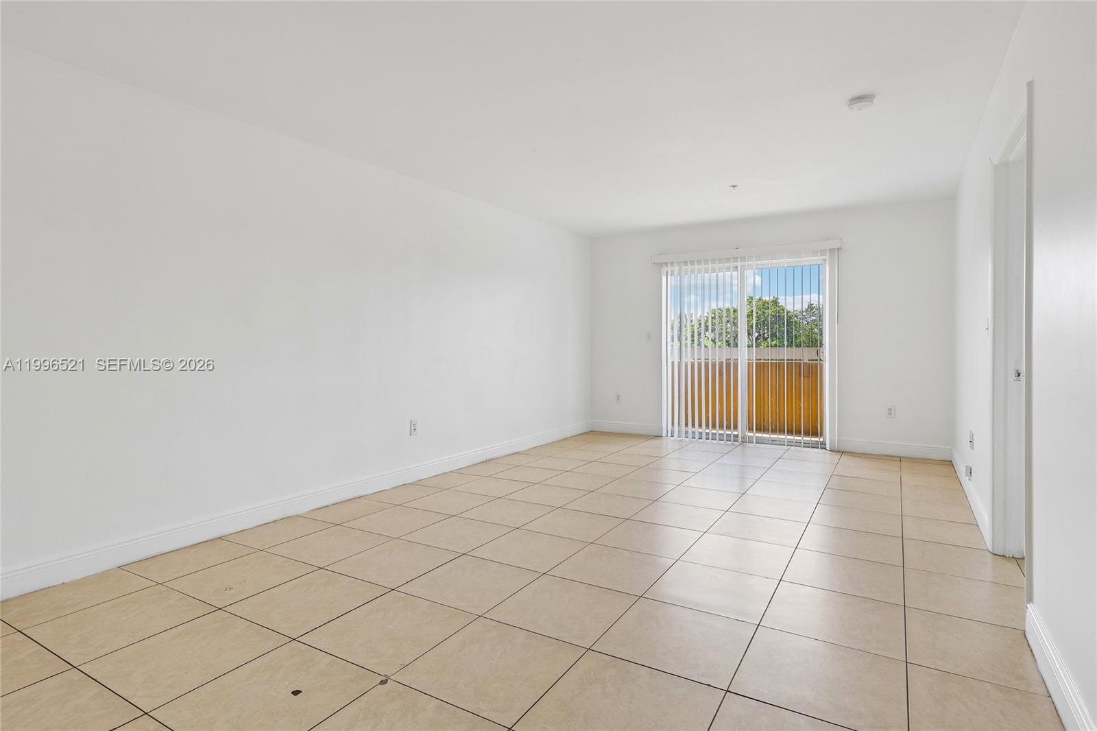 4137 Stirling Road, Unit 507 Dania Beach, FL 33314 - Photo 9 of 20 a view of an empty room and window