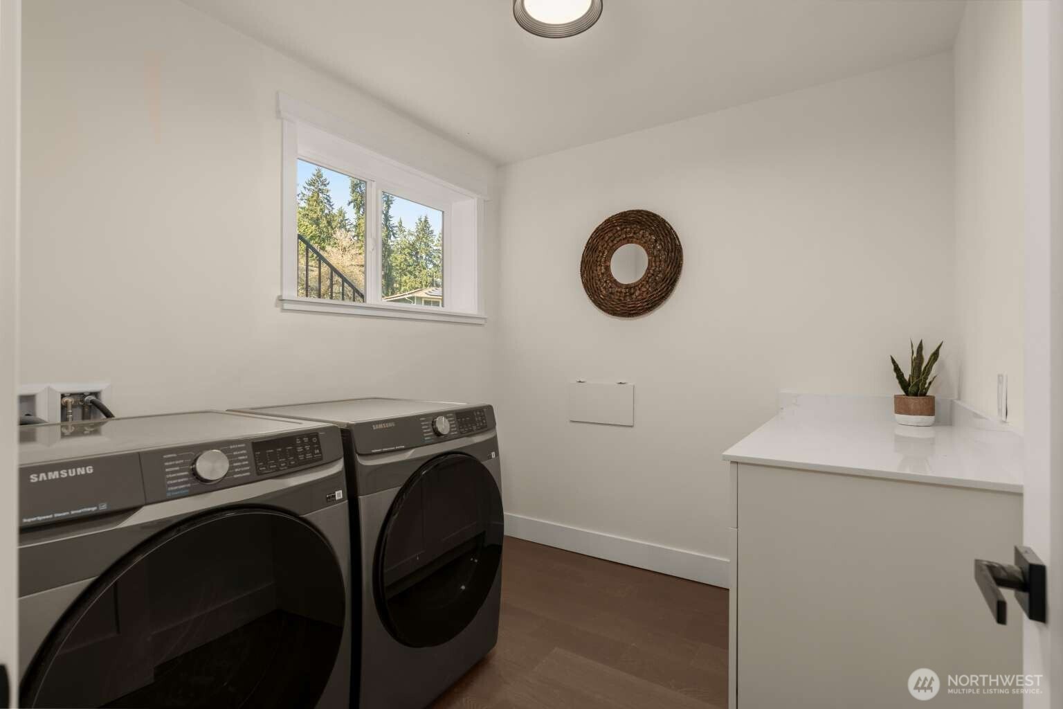 10811 Northeast 154th Court Bothell, WA 98011 - Photo 17 of 28 a utility room with dryer and washer