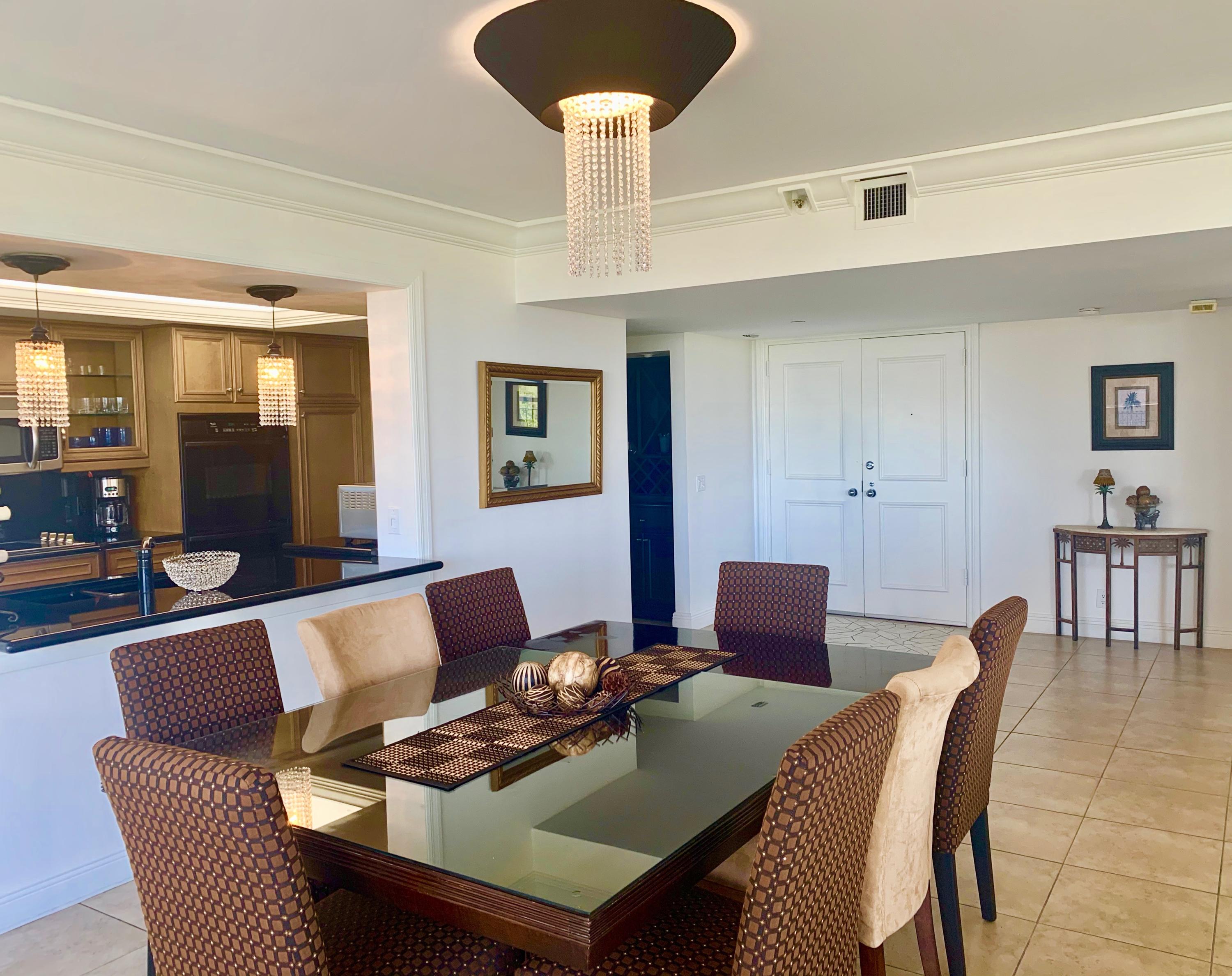 4100 North Ocean Drive, Unit 503 Singer Island, FL 33404 - Photo 15 of 51 a living room with furniture and a table