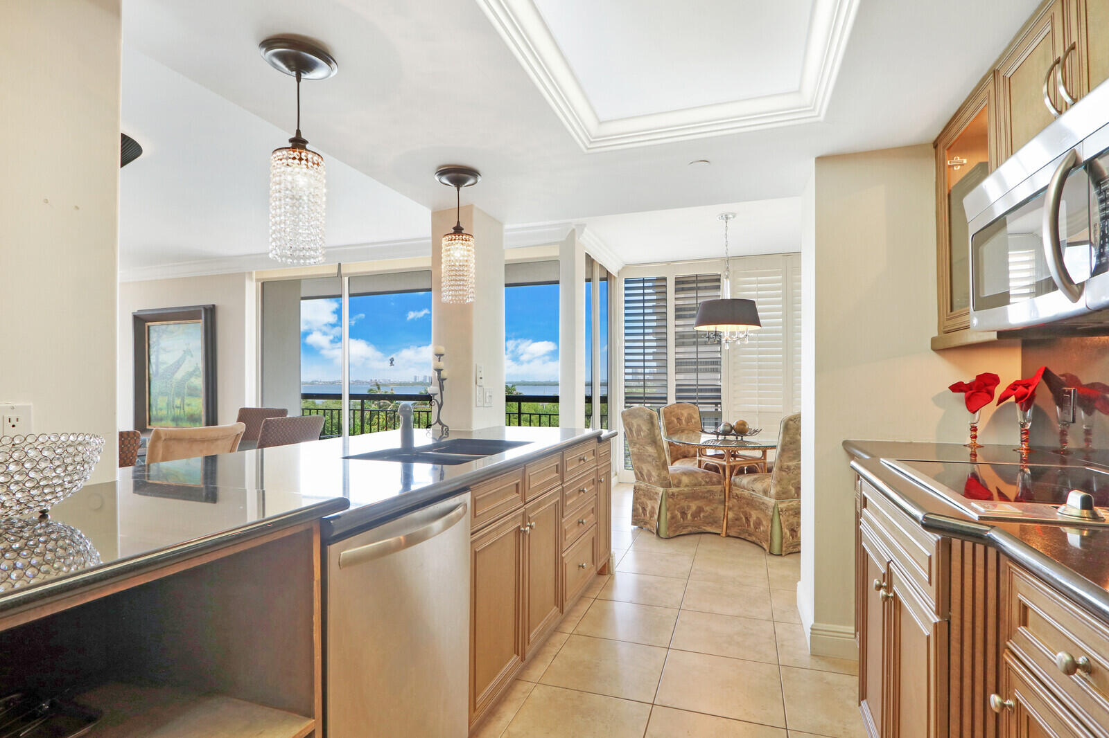4100 North Ocean Drive, Unit 503 Singer Island, FL 33404 - Photo 18 of 51 a very nice looking kitchen with a large window