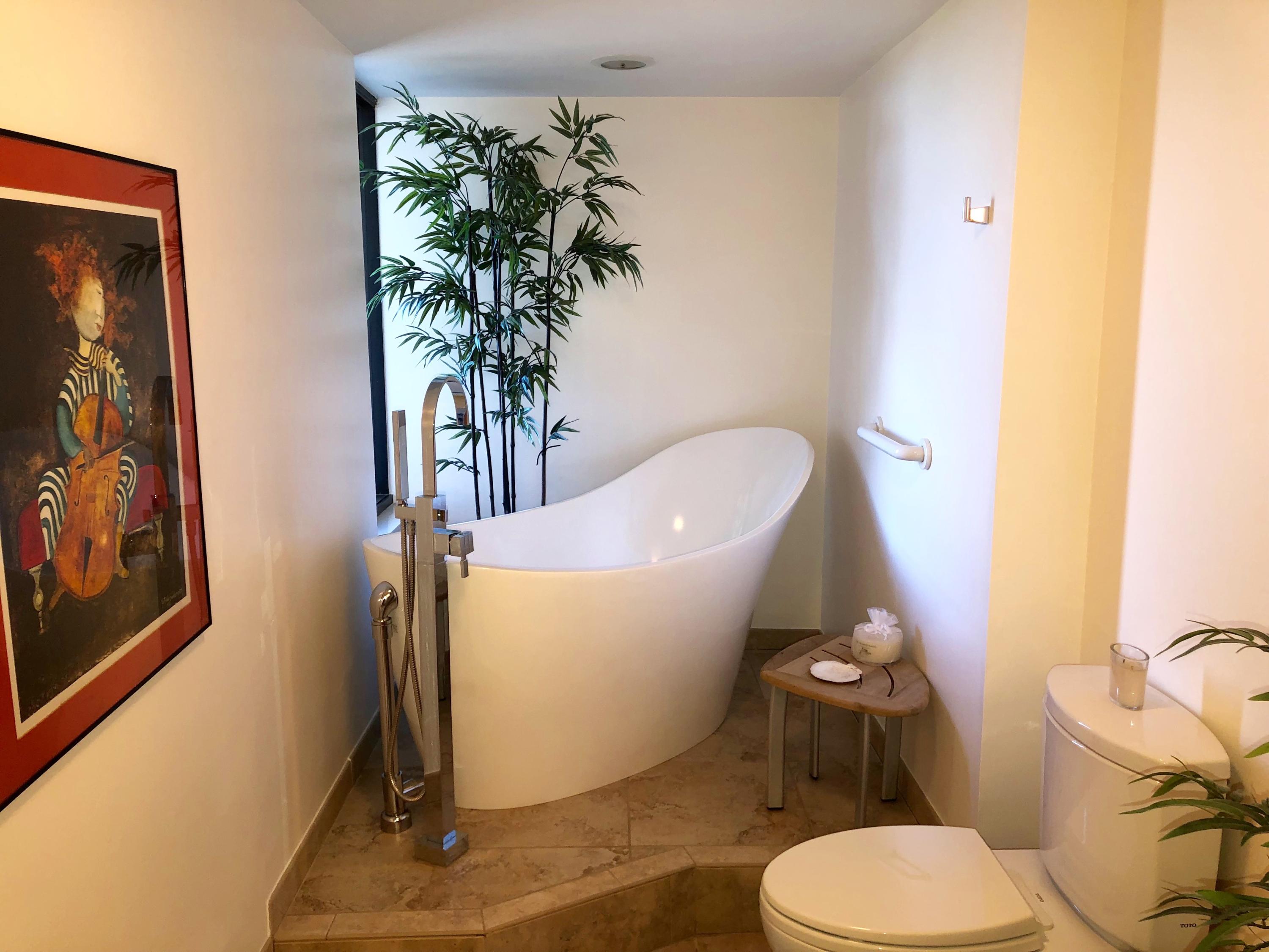 4100 North Ocean Drive, Unit 503 Singer Island, FL 33404 - Photo 32 of 51 a white toilet sitting next to a sink