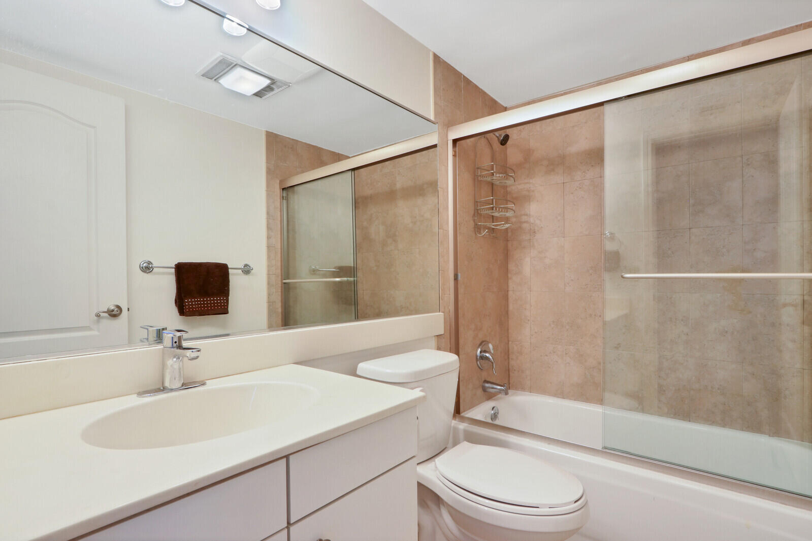 4100 North Ocean Drive, Unit 503 Singer Island, FL 33404 - Photo 35 of 51 a bathroom with a sink toilet and shower