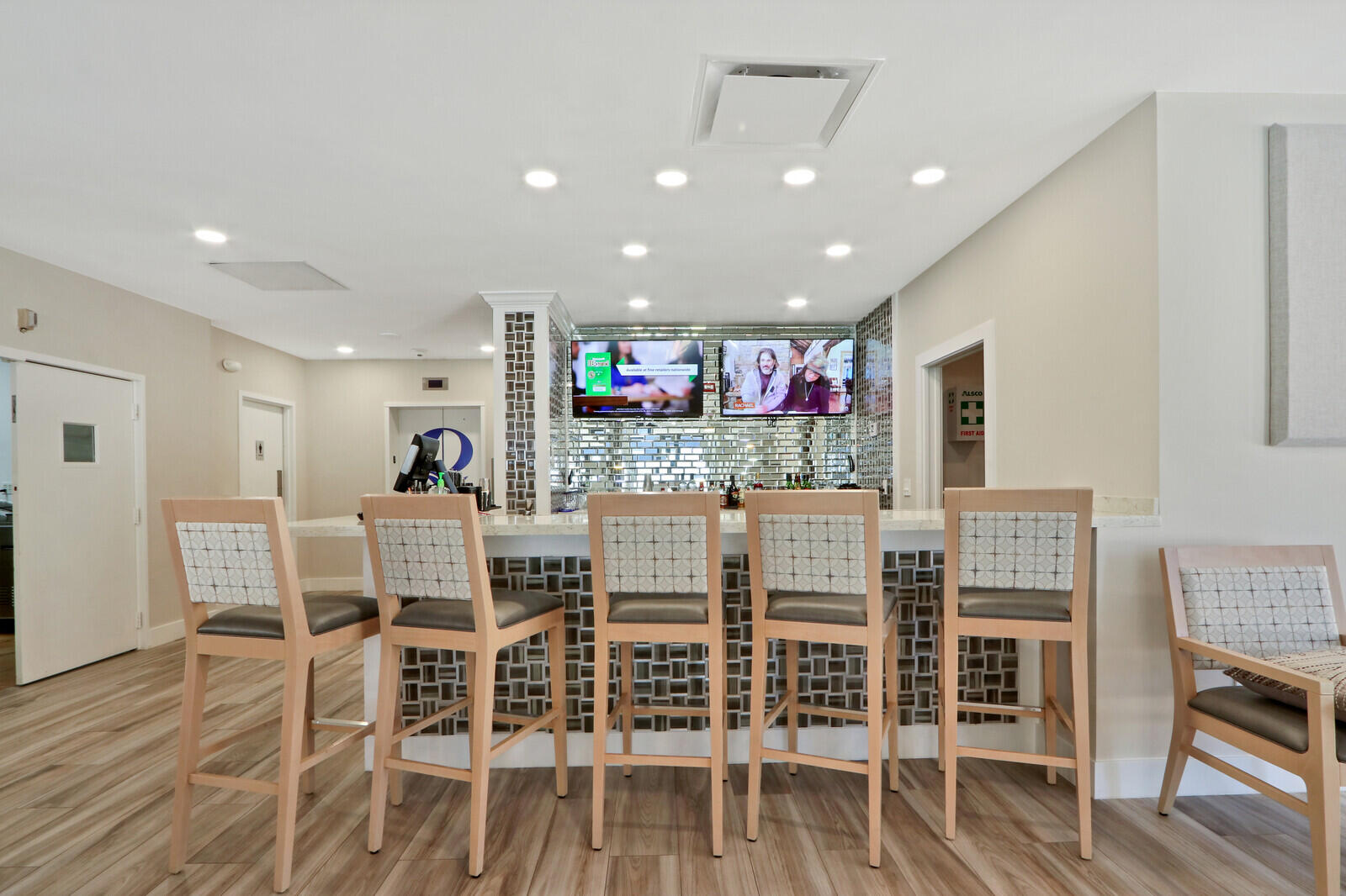 4100 North Ocean Drive, Unit 503 Singer Island, FL 33404 - Photo 43 of 51 a view of a dining room with furniture wooden floor and chandelier