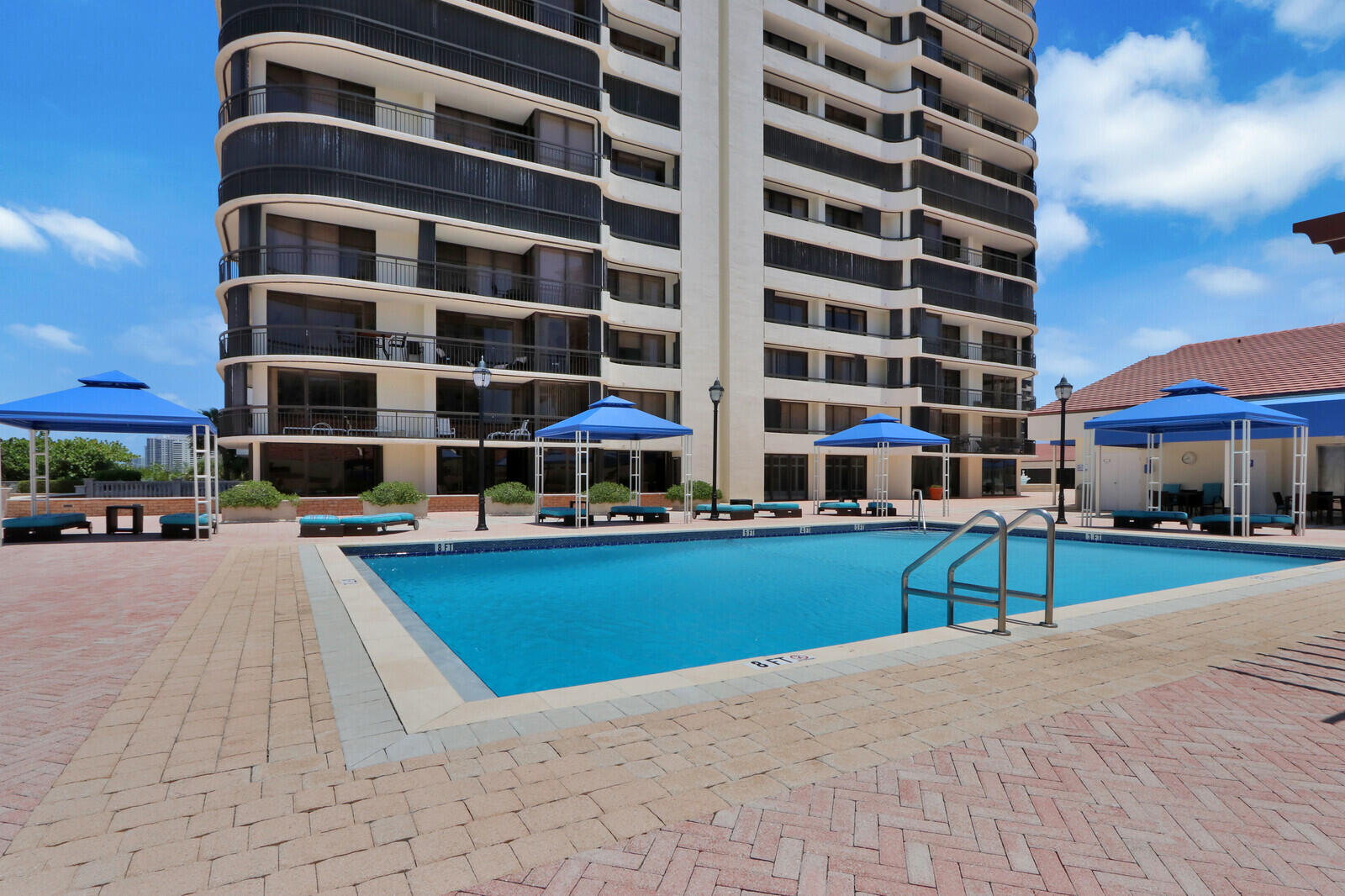 4100 North Ocean Drive, Unit 503 Singer Island, FL 33404 - Photo 45 of 51 a building view with swimming pool in front of it