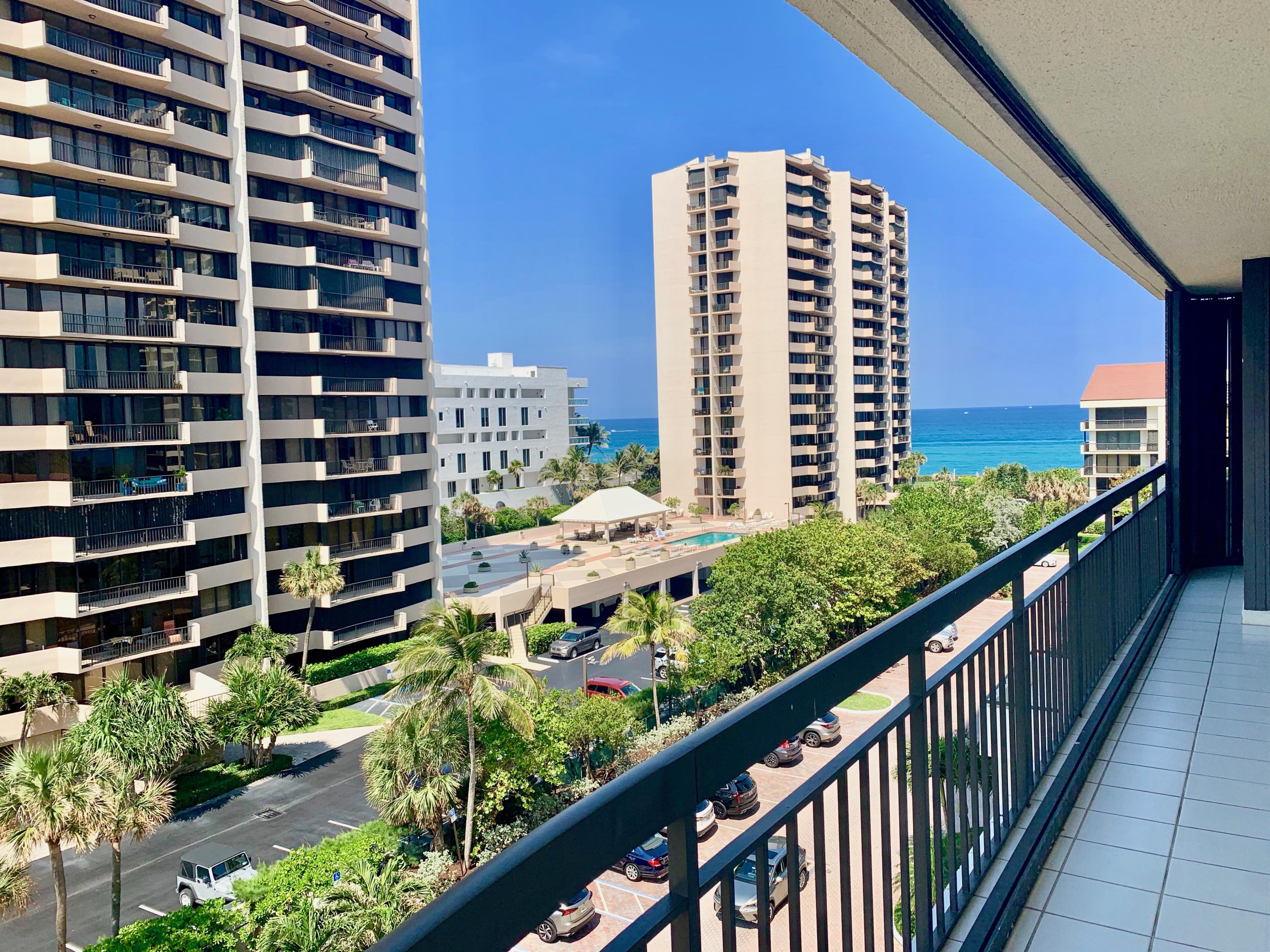 4100 North Ocean Drive, Unit 503 Singer Island, FL 33404 - Photo 5 of 51 a view of a balcony with a couple of flower plants