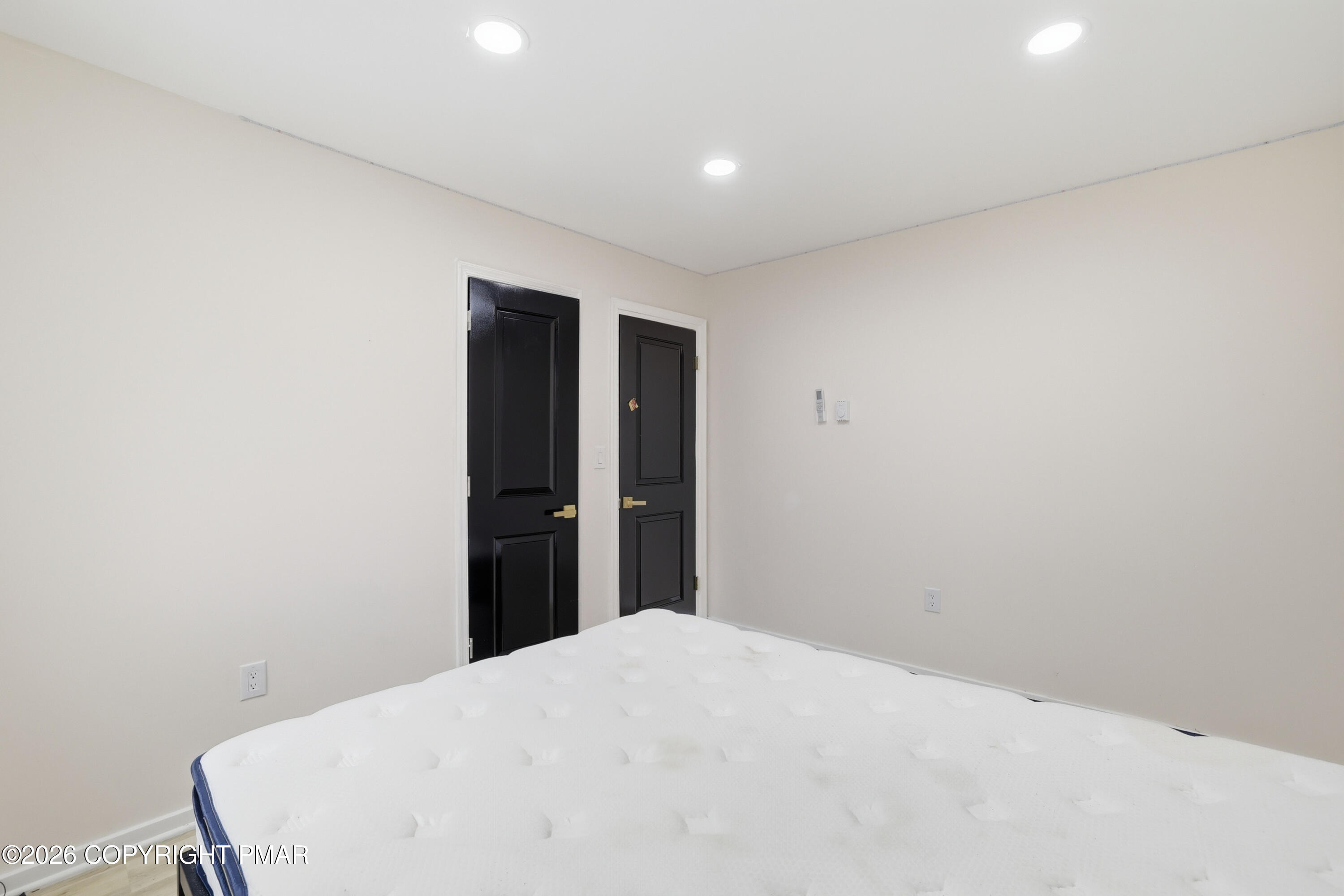 319 Ramble Bush Road Stroudsburg, PA 18360 - Photo 17 of 51 a bed room with a bed