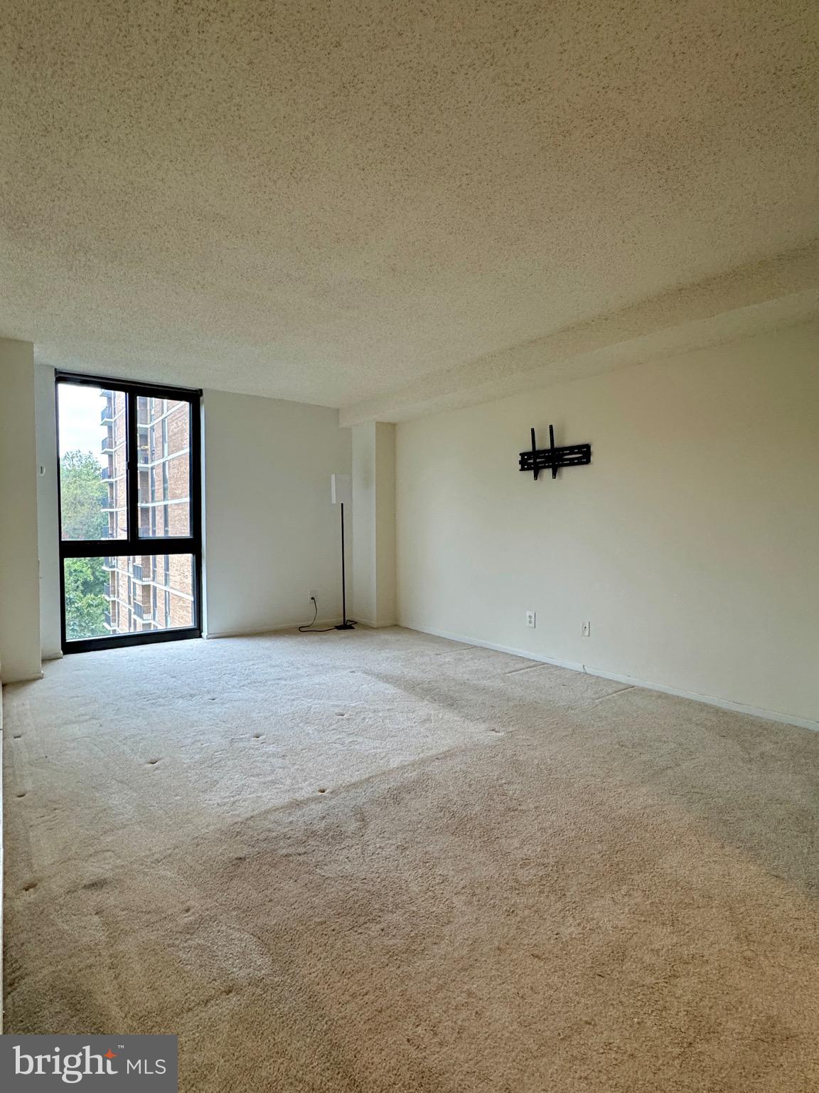 2300 Pimmit Drive, Unit 719 Falls Church, VA 22043 - Photo 8 of 15 a view of an empty room with a window