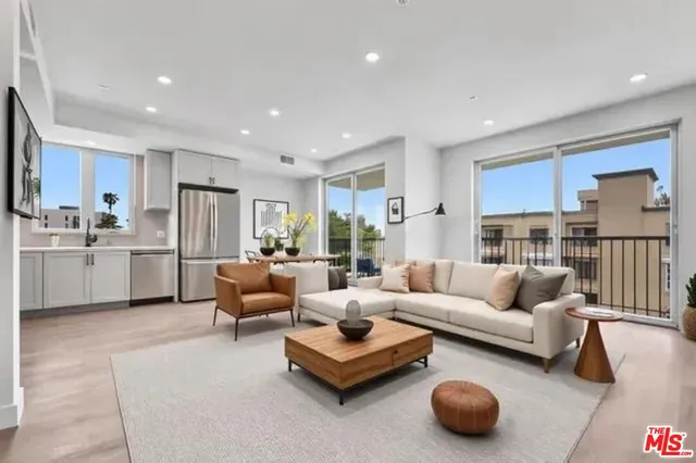 a living room with furniture and a couch