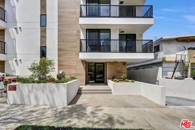 a view of a house with roof deck