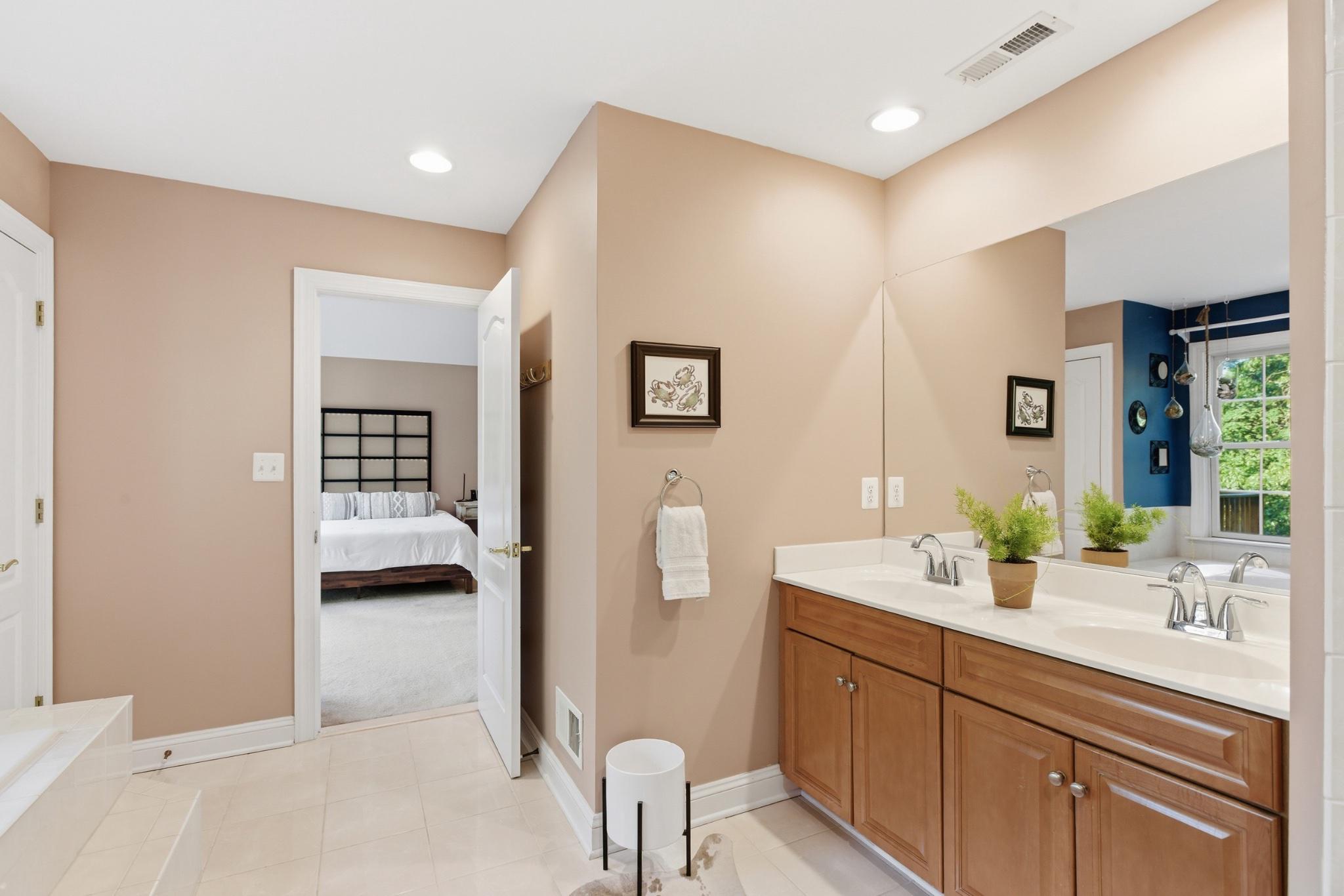 1219 Meadow View Road Pasadena, MD 21122 - Photo 32 of 70 Primary Suite serene bathroom with modern touches.