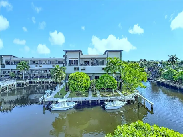 a aerial view of a house with plants and trees