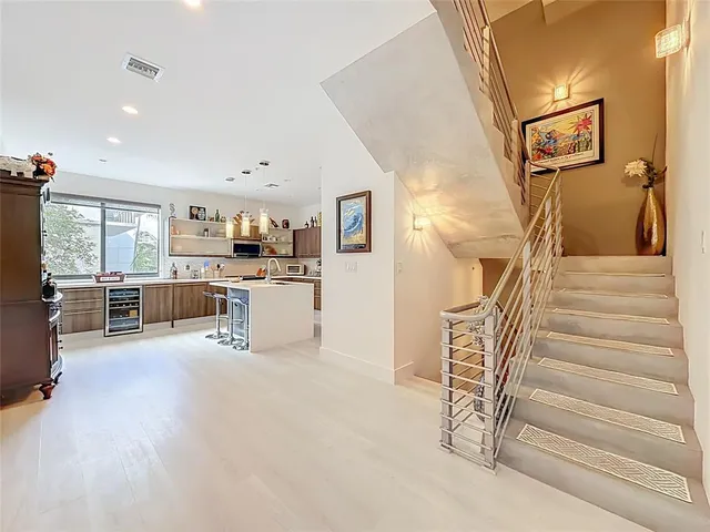 a view of a kitchen with furniture and a kitchen