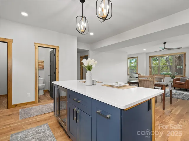 a view of a kitchen counter space and a sink