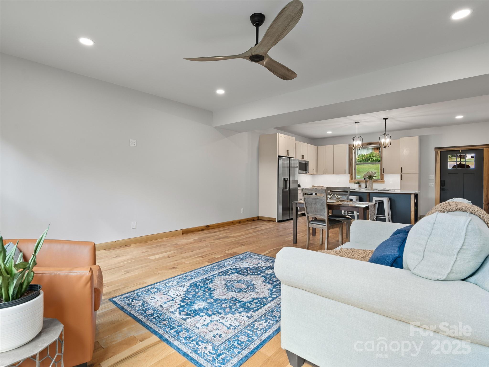 292 County Road Waynesville, NC 28785 - Photo 15 of 26 a living room with furniture and a rug