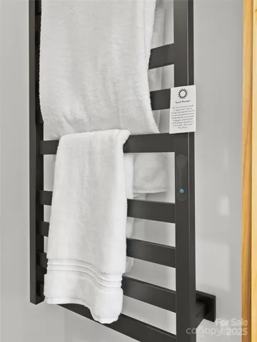 a view of staircase with white walls