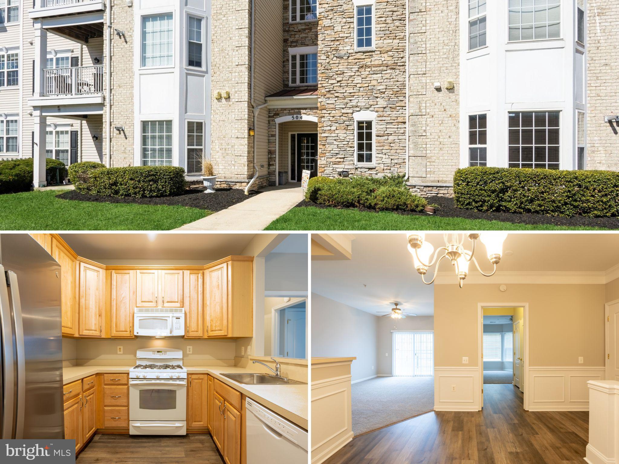 a view of a kitchen with stainless steel appliances and cabinets
