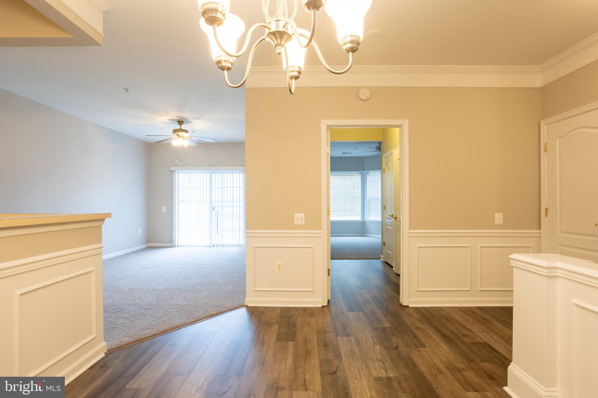 504 Lloyd Place Bel Air, MD 21014 - Photo 12 of 40 a view of livingroom with kitchen and hardwood