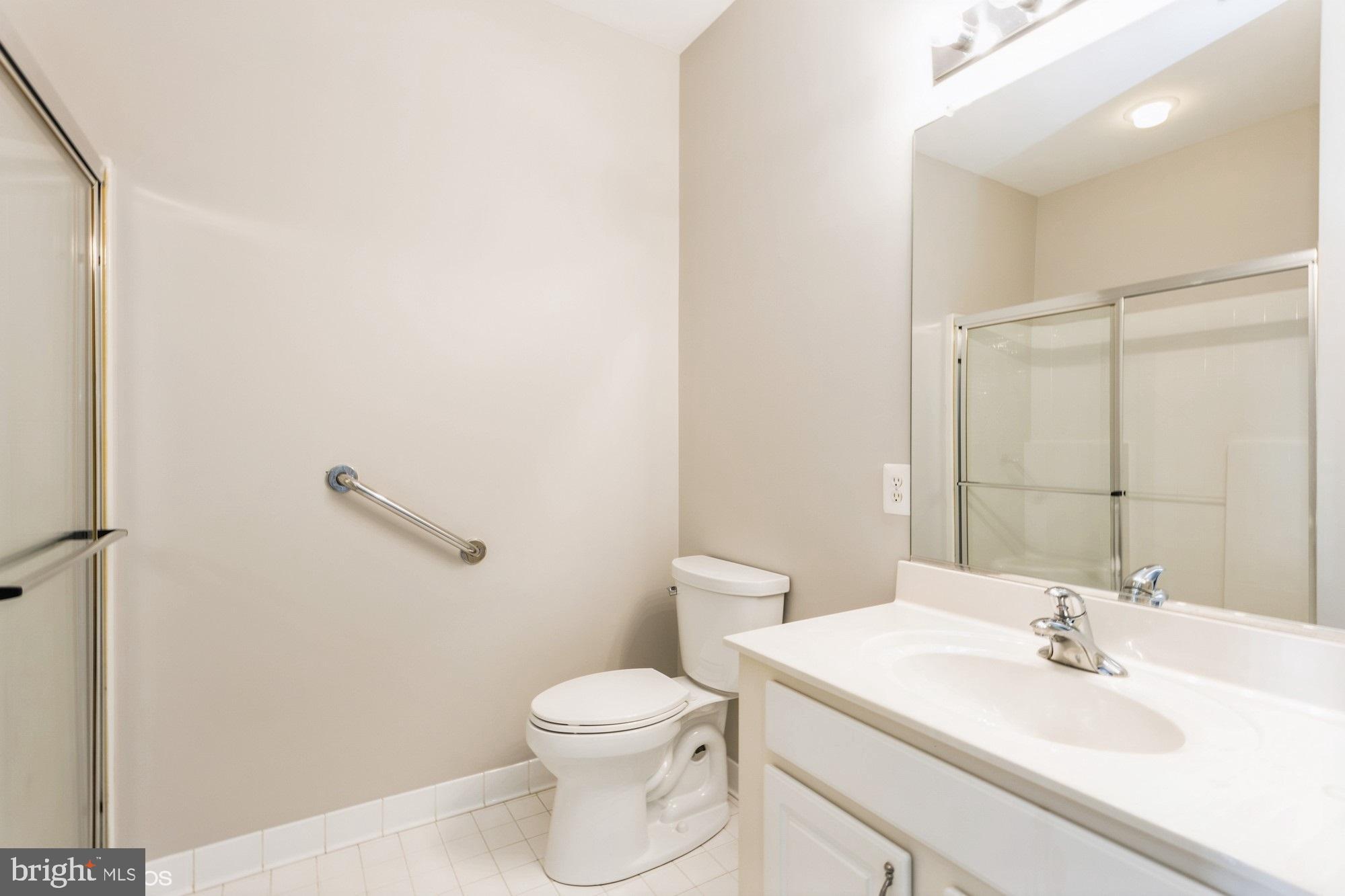 504 Lloyd Place Bel Air, MD 21014 - Photo 25 of 40 a bathroom with a sink a toilet and mirror