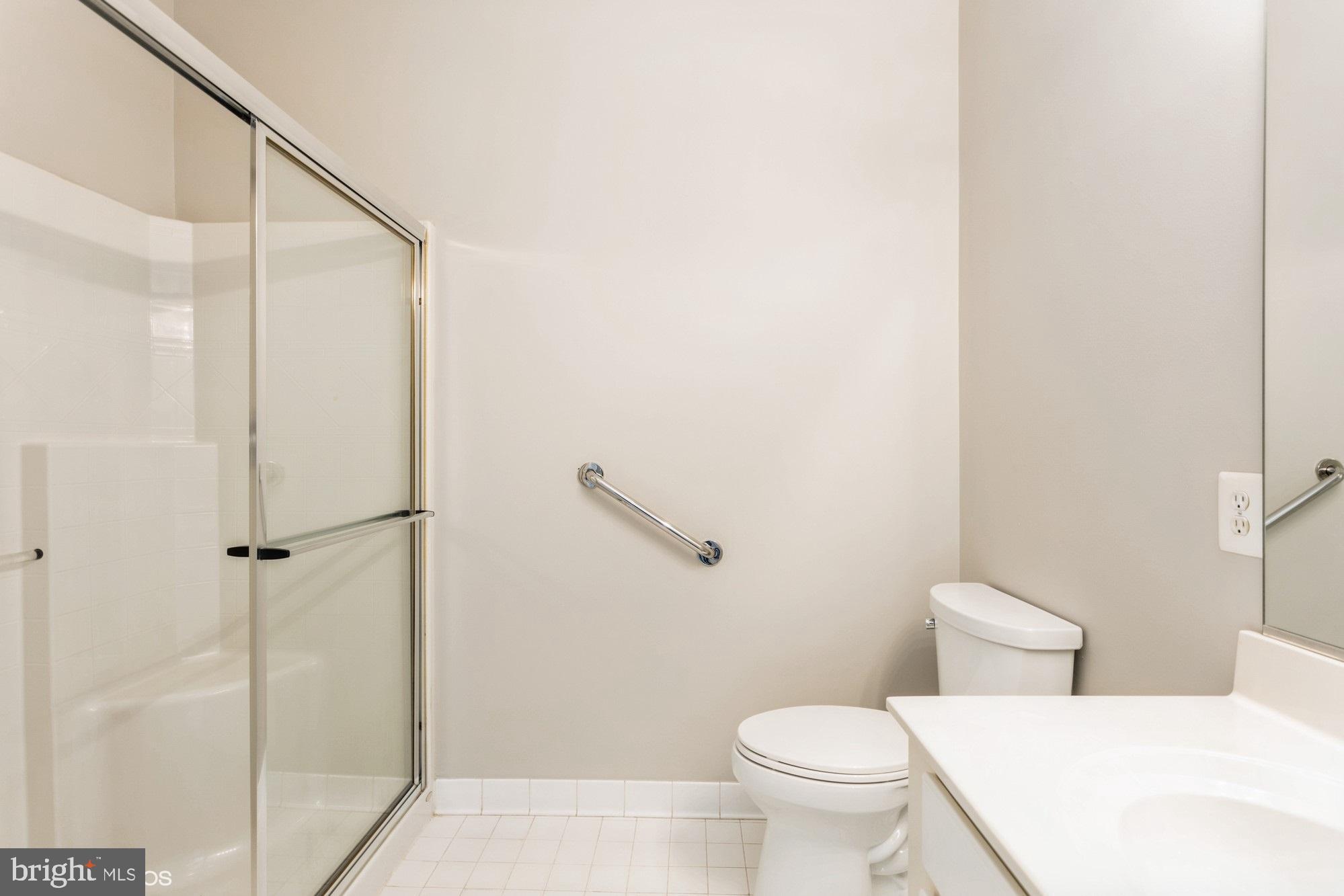 504 Lloyd Place Bel Air, MD 21014 - Photo 26 of 40 a white toilet sitting next to a bathroom sink