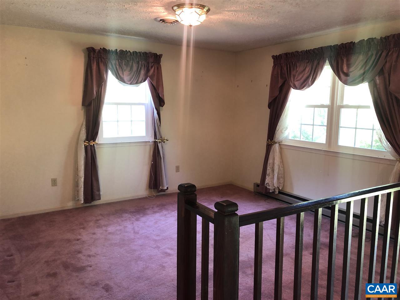 969 Phoenix Road Arrington, VA 22922 - Photo 4 of 28 a view of entryway with a window and wooden floor