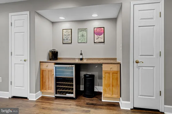 a view of kitchen with wooden floor