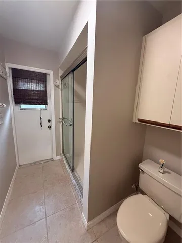 a bathroom with a toilet