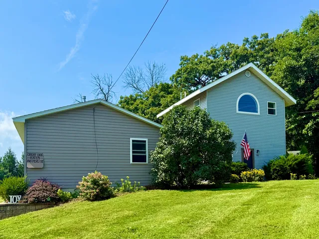 a house view with a garden space