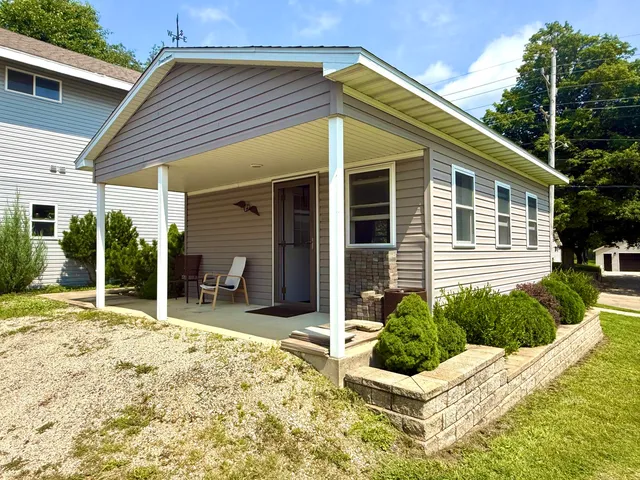a house with yard in front of it