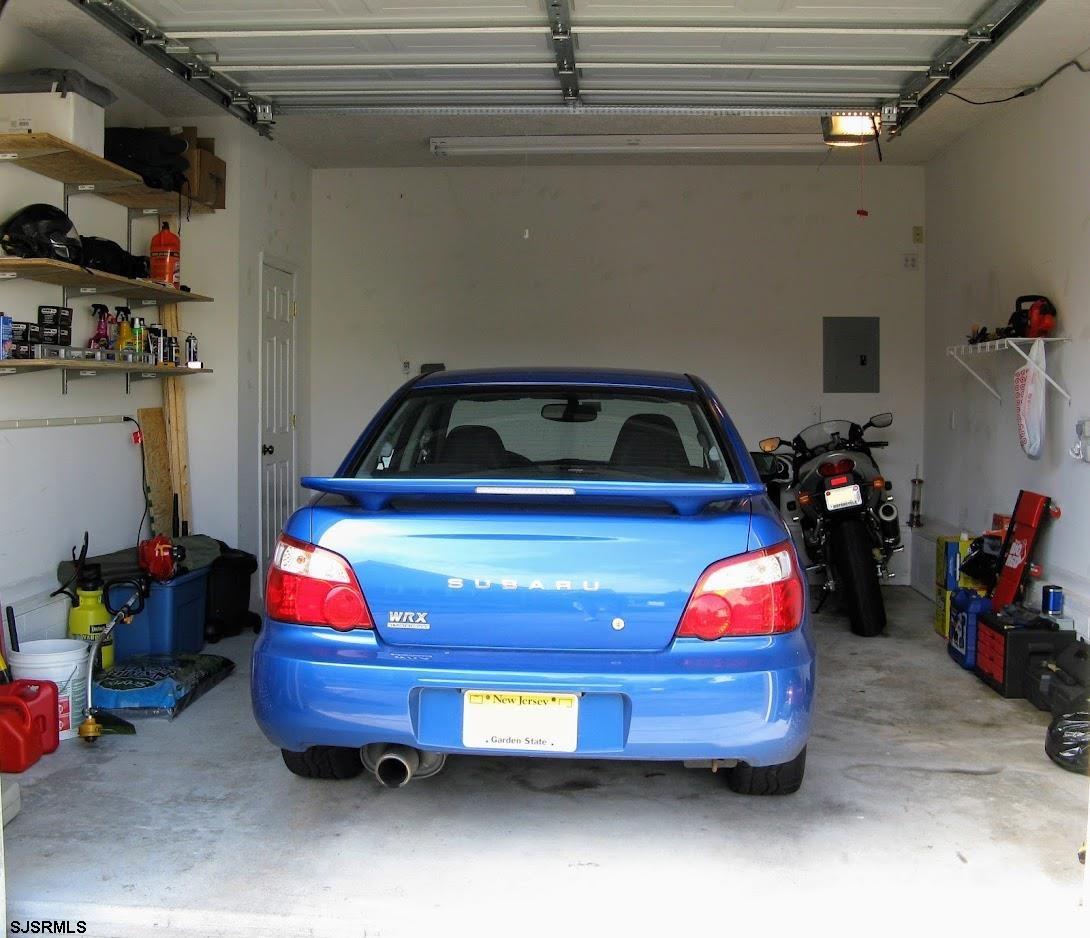 6 Stone Circle Absecon, NJ 08201 - Photo 29 of 39 a car parked in a garage