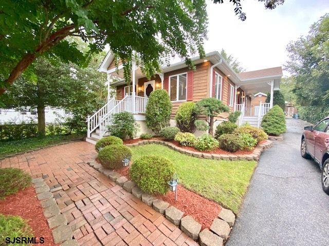 6 Stone Circle Absecon, NJ 08201 - Photo 4 of 39 a front view of a house with a yard