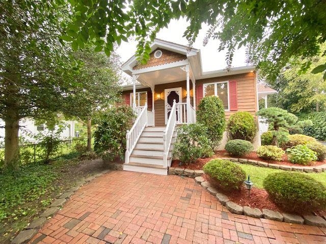 6 Stone Circle Absecon, NJ 08201 - Photo 33 of 39 a front view of a house with a yard and trees