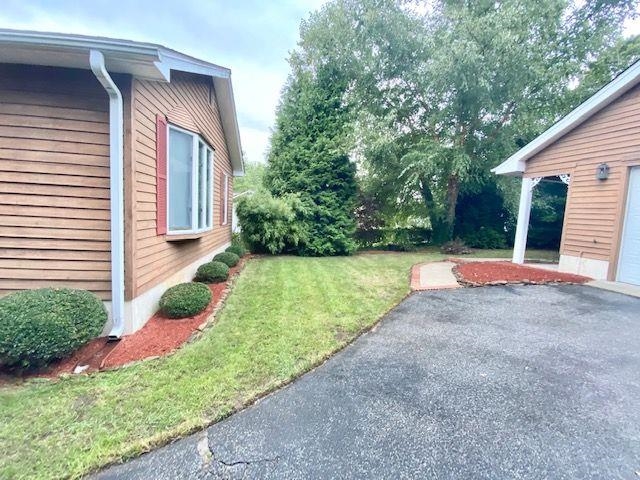 6 Stone Circle Absecon, NJ 08201 - Photo 34 of 39 a view of backyard with potted plants and a large tree