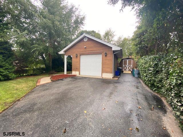 6 Stone Circle Absecon, NJ 08201 - Photo 38 of 39 a view of a house with a yard and large trees
