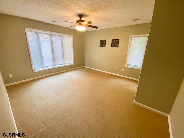 6 Stone Circle Absecon, NJ 08201 - Photo 5 of 39 a view of an empty room with a window
