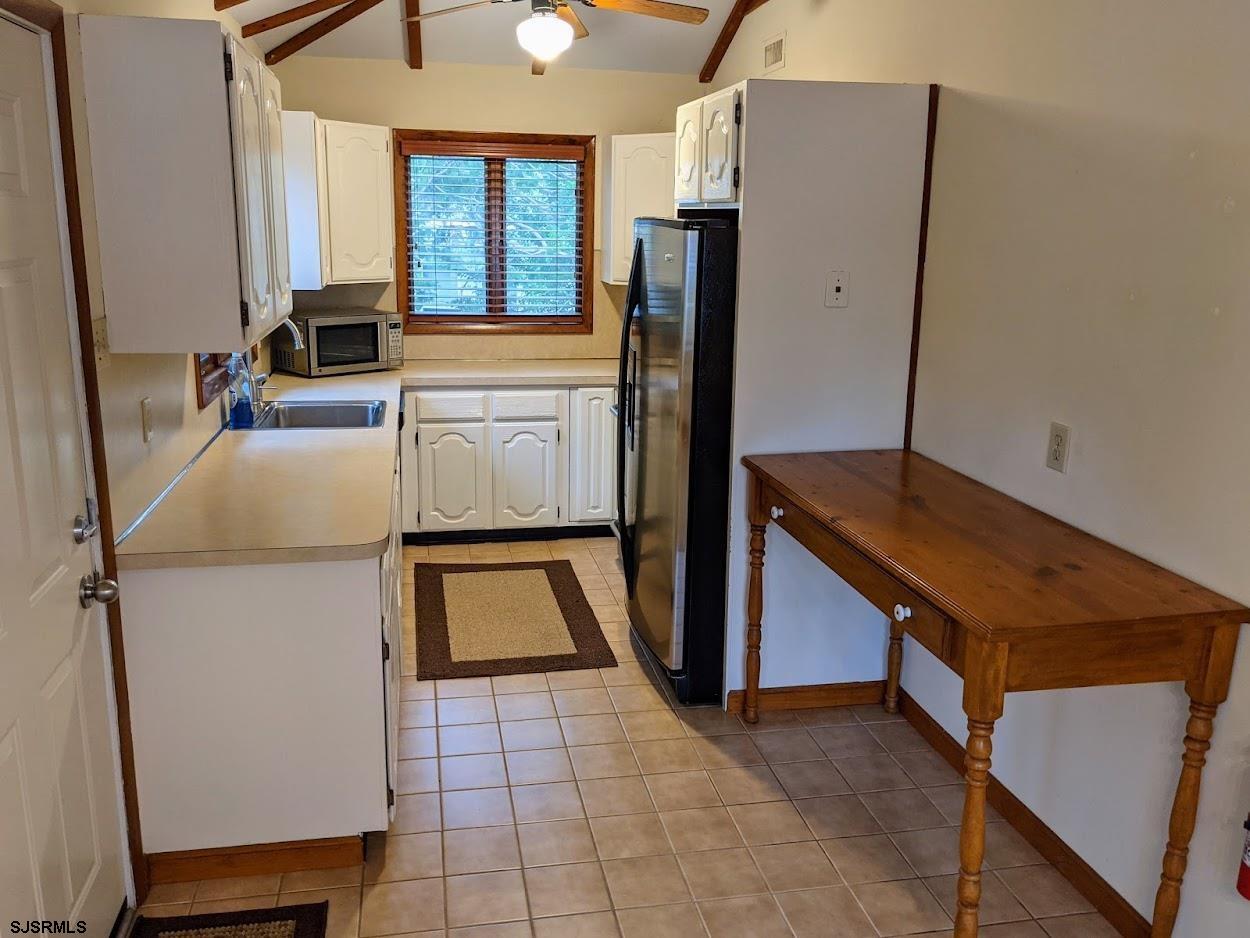 6 Stone Circle Absecon, NJ 08201 - Photo 9 of 39 a kitchen with refrigerator and window