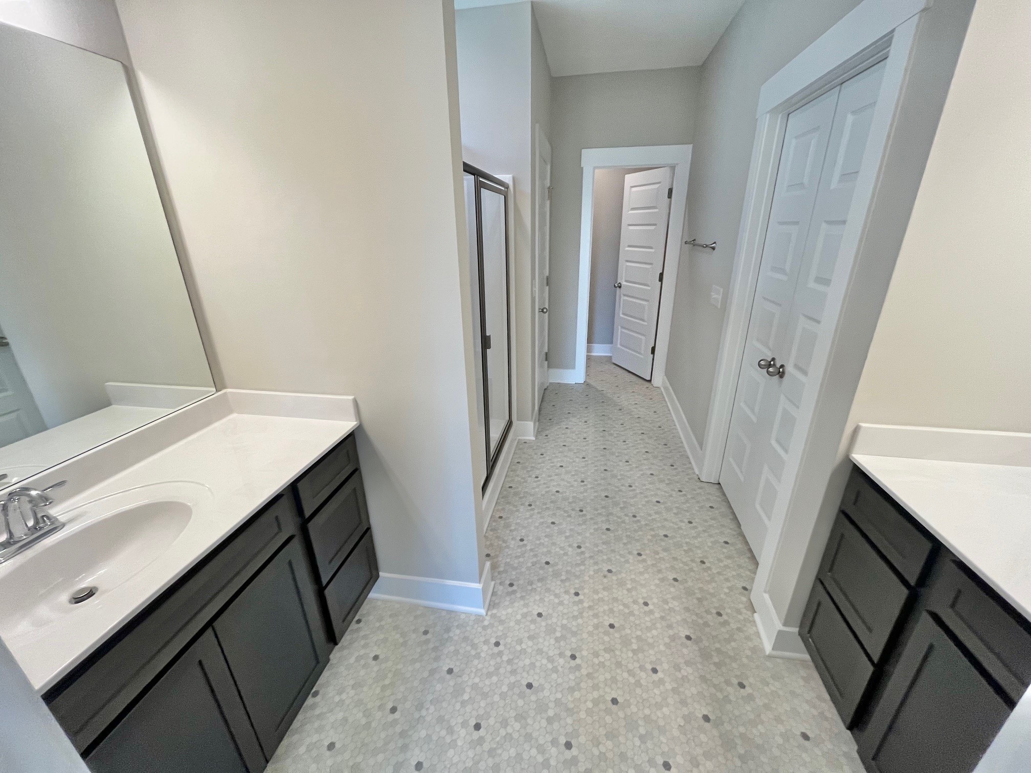 414 Wren Way Spring Hill, TN 37174 - Photo 11 of 12 a bathroom with a sink a toilet and a mirror