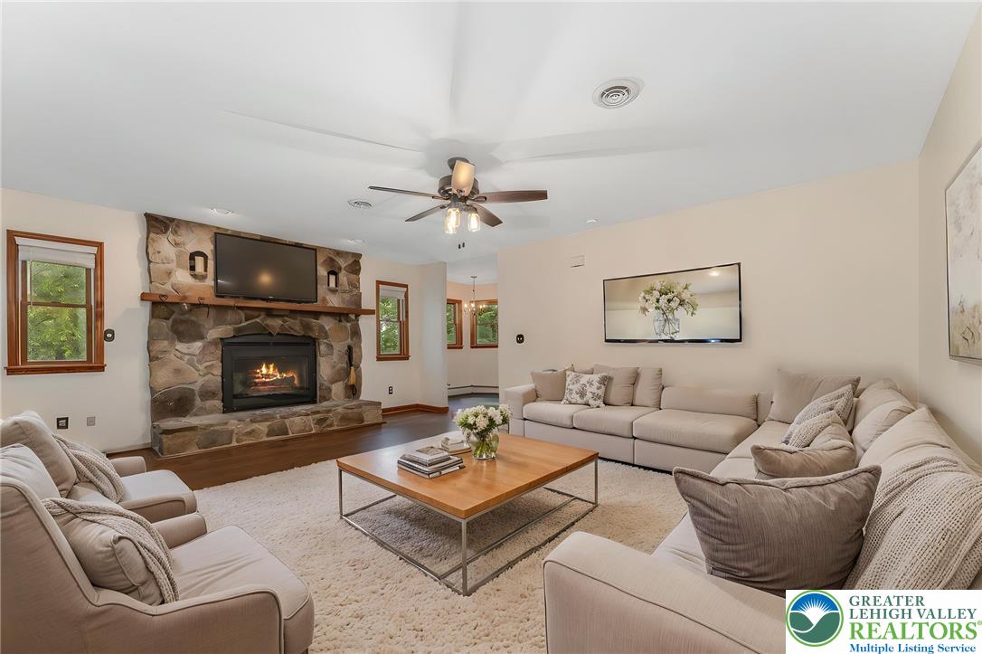 465 Raubsville Road Easton, PA 18042 - Photo 27 of 60 Virtually staged. A spacious living room welcomes with a natural stone fireplace.