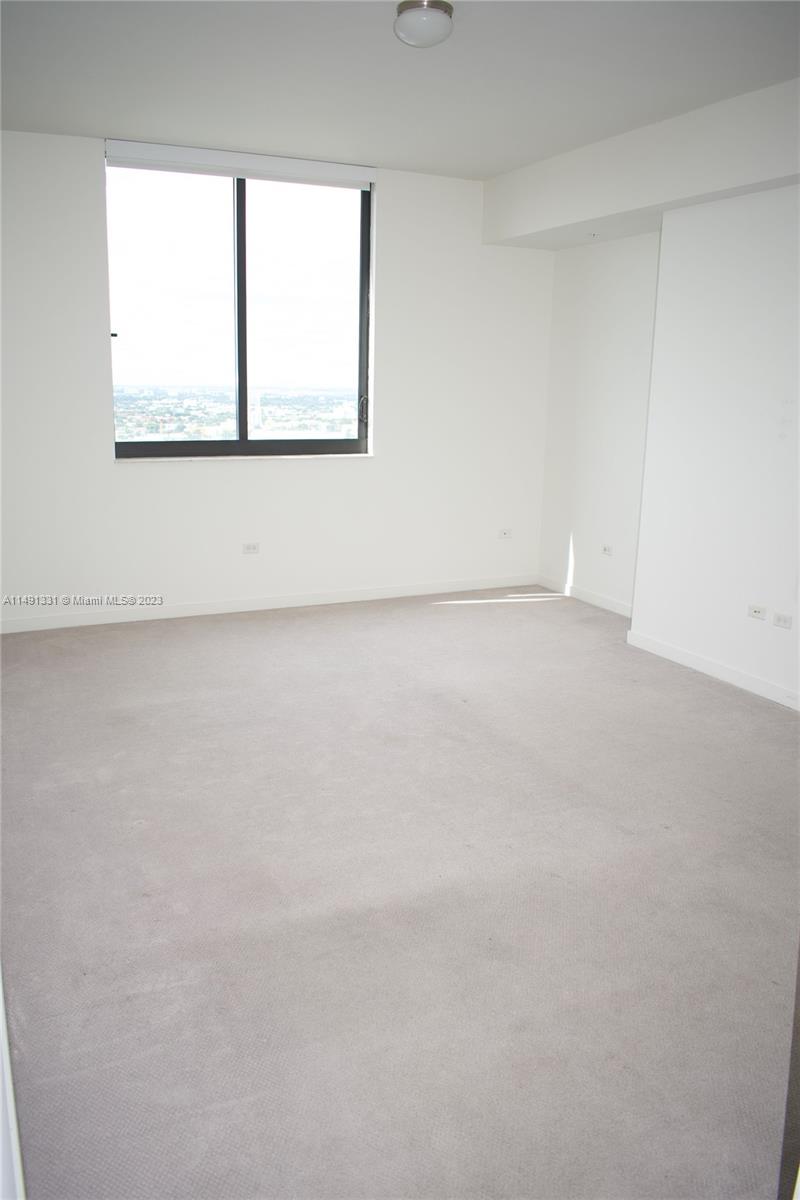 Brickell Miami, FL 33130 - Photo 18 of 20 an empty room with a window
