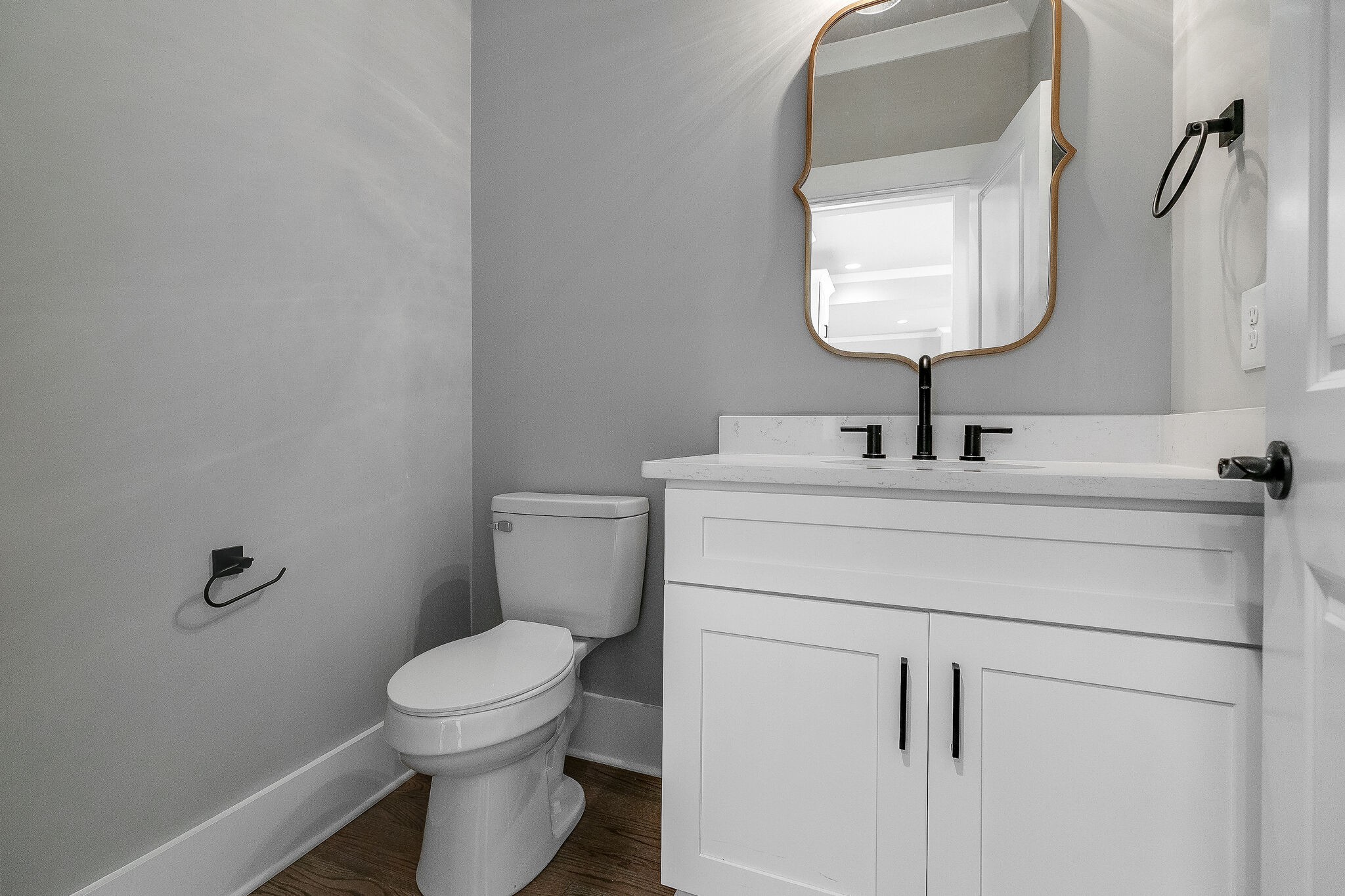 108 Arkstone Ln Spring Hill Spring Hill, TN 37174 - Photo 16 of 37 a bathroom with a toilet sink and mirror
