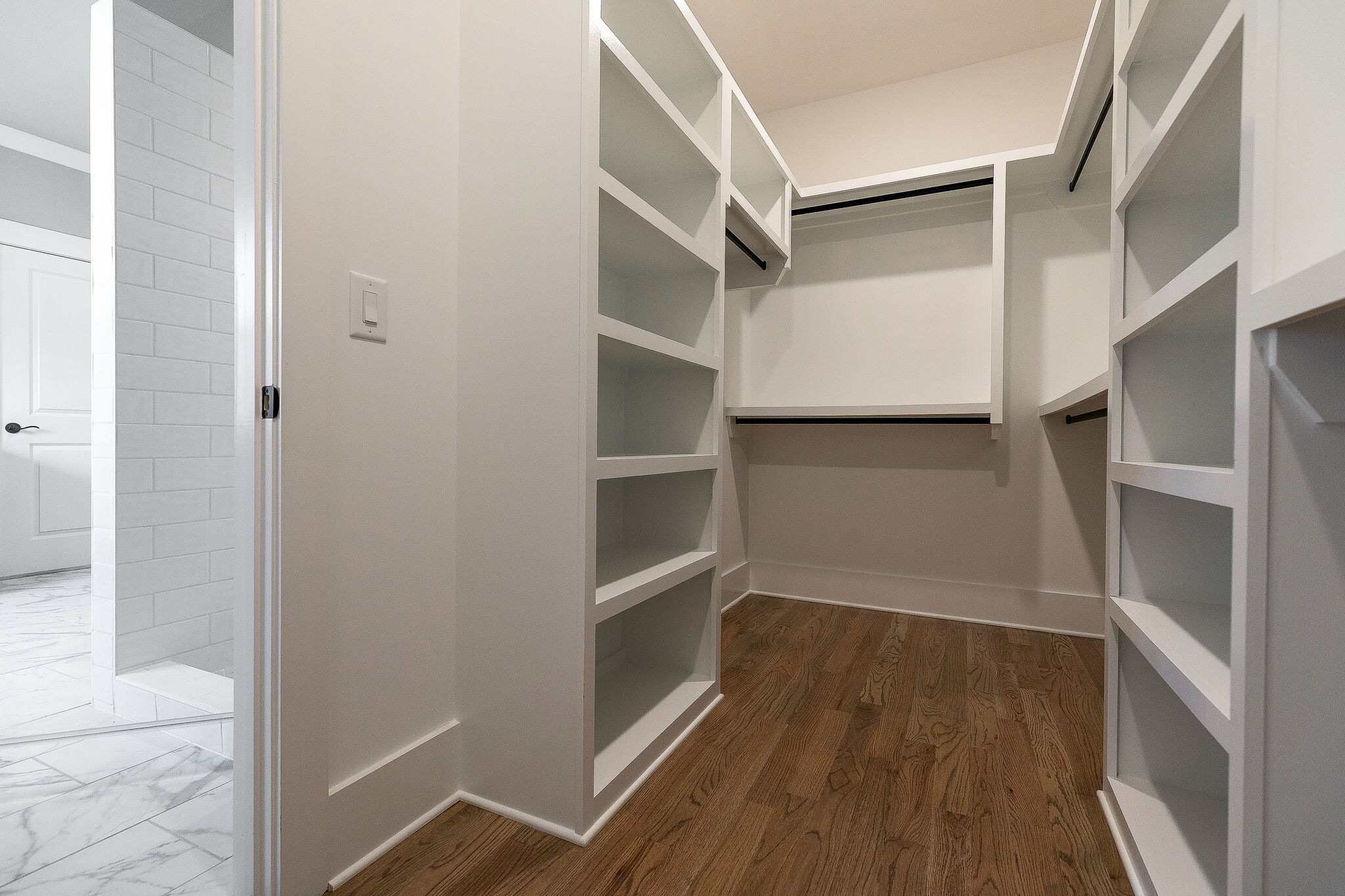 108 Arkstone Ln Spring Hill Spring Hill, TN 37174 - Photo 21 of 37 a view of walk in closet with wooden floor