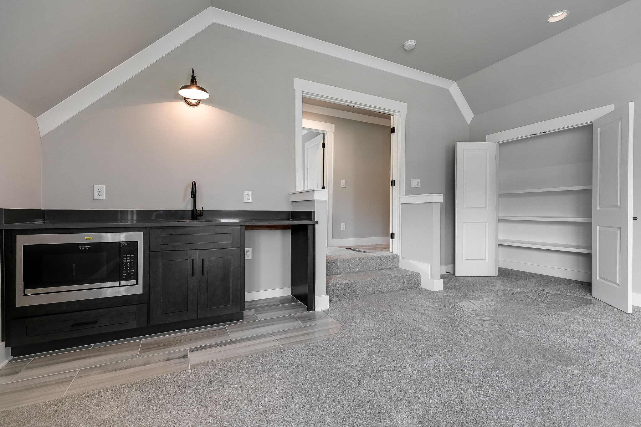 108 Arkstone Ln Spring Hill Spring Hill, TN 37174 - Photo 25 of 37 a kitchen with a stove and a microwave