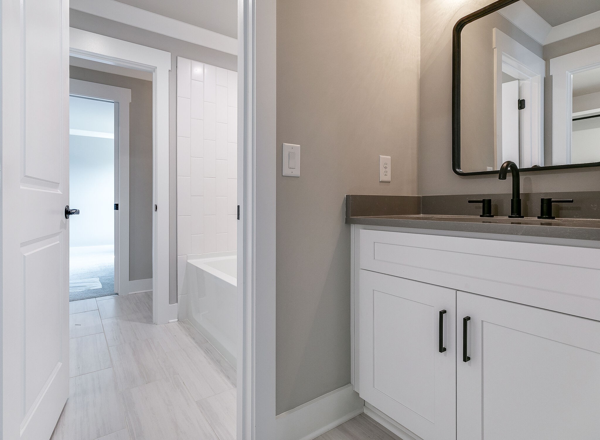 108 Arkstone Ln Spring Hill Spring Hill, TN 37174 - Photo 28 of 37 a bathroom with a granite countertop sink and a mirror