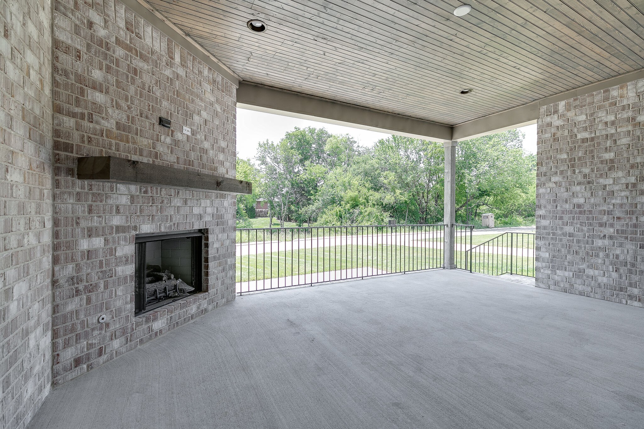 108 Arkstone Ln Spring Hill Spring Hill, TN 37174 - Photo 32 of 37 a view of empty room with floor to ceiling window and fireplace