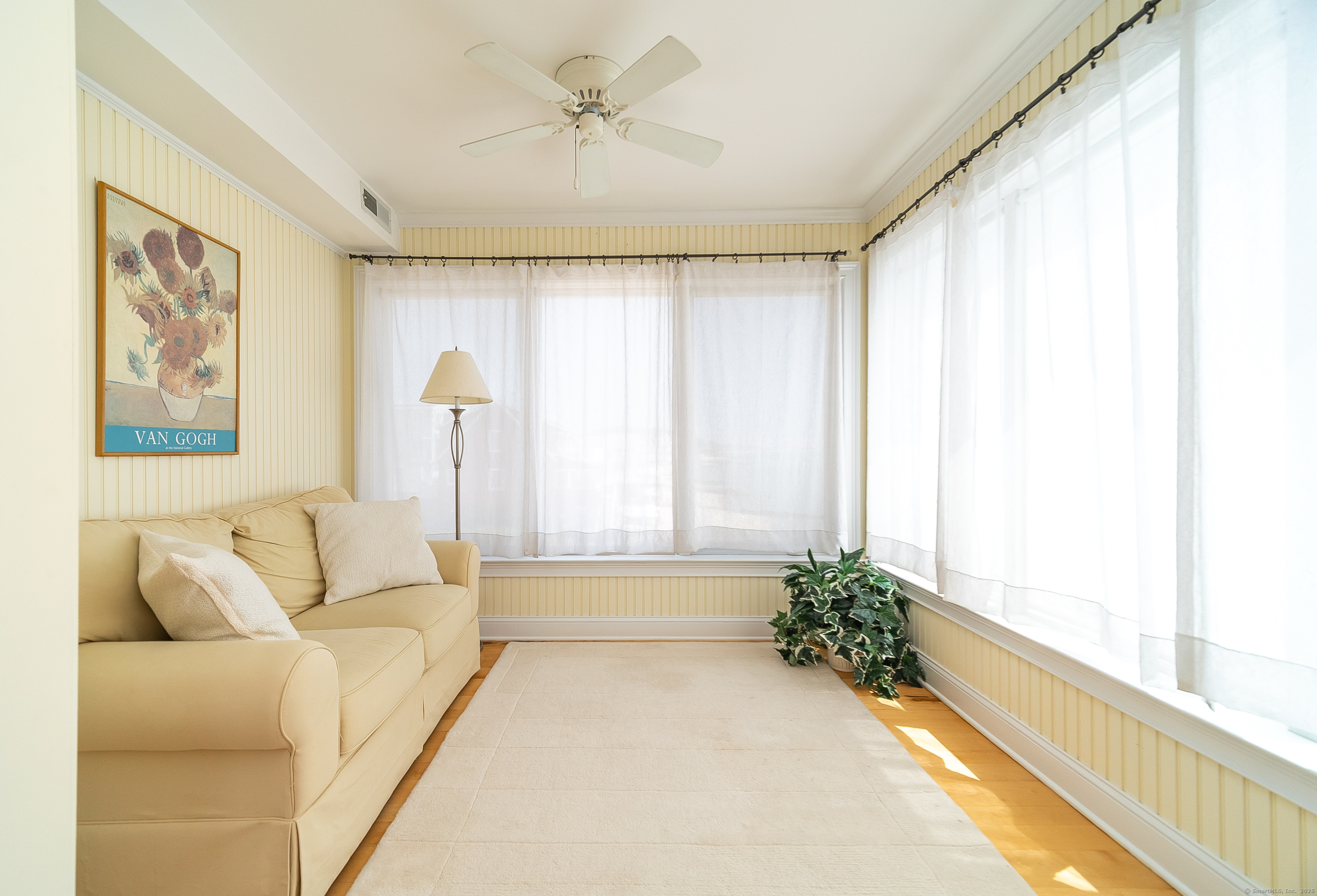 167 Shore Road Clinton, CT 06413 - Photo 19 of 40 Sitting area in primary bedroom overlooking the water.