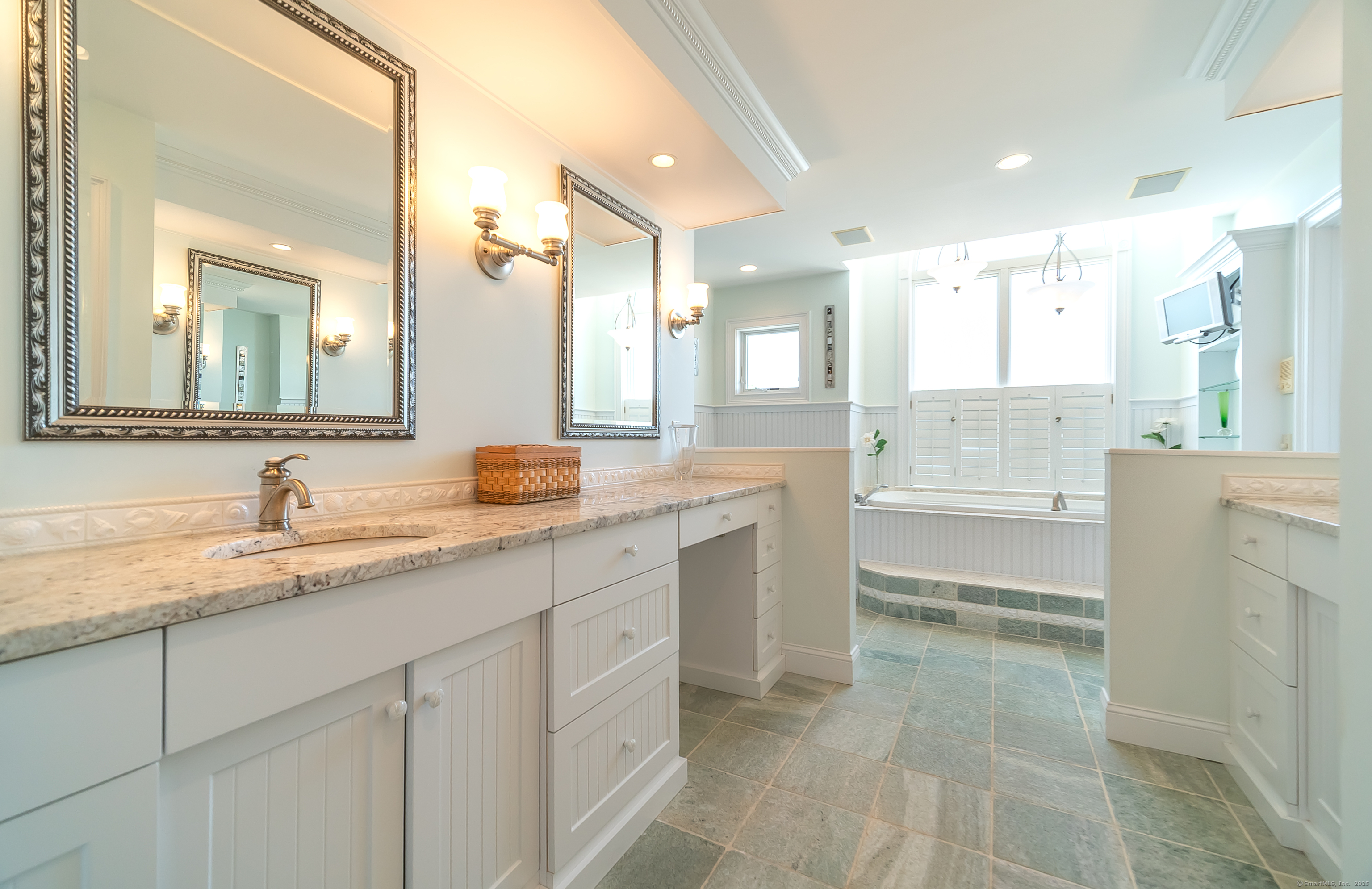 167 Shore Road Clinton, CT 06413 - Photo 21 of 40 Primary bathroom with double vanities, jet-tub, full shower, and separate toilet room.