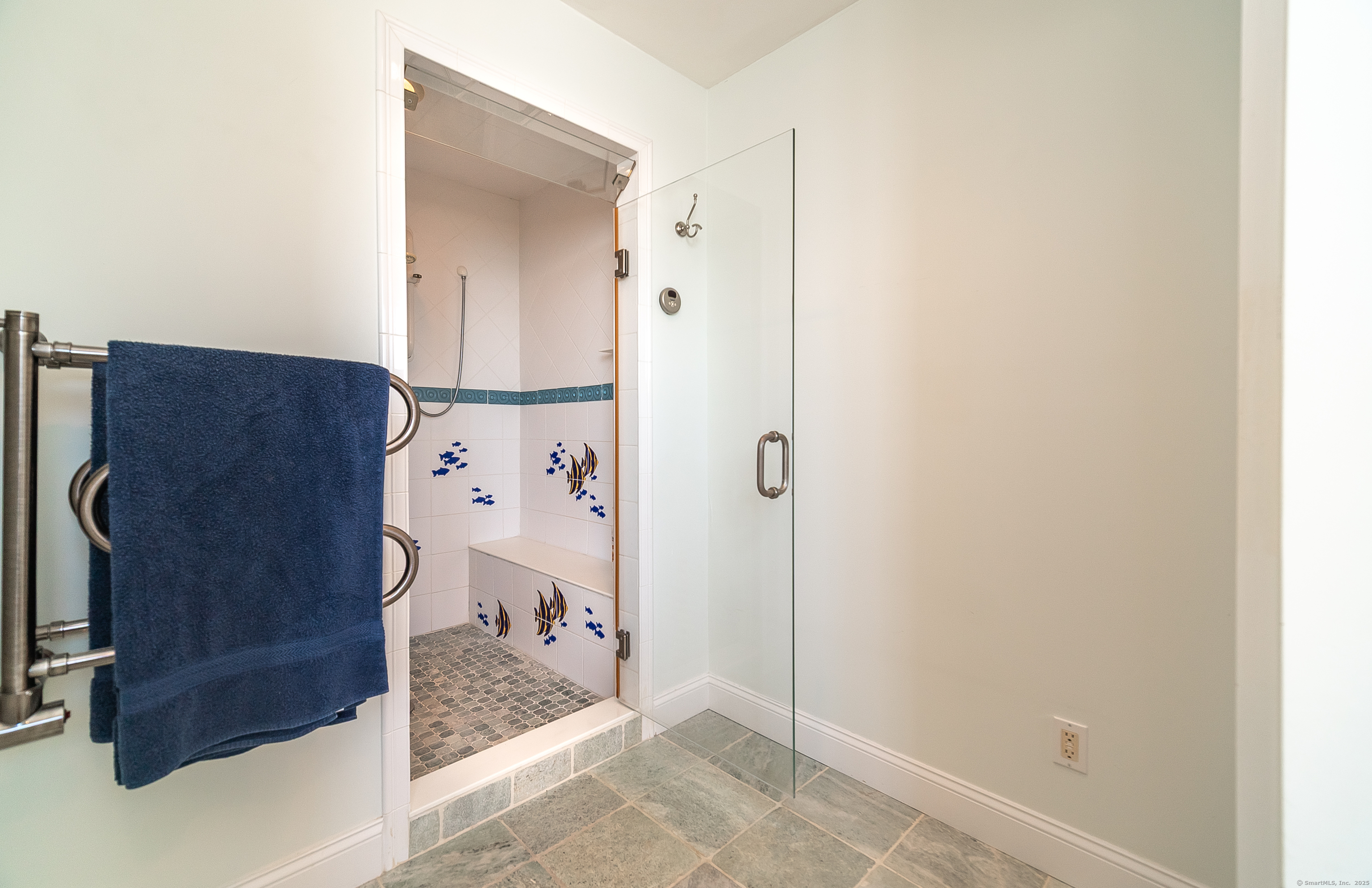 167 Shore Road Clinton, CT 06413 - Photo 23 of 40 Shower area in primary bathroom has radiant in-floor heating.