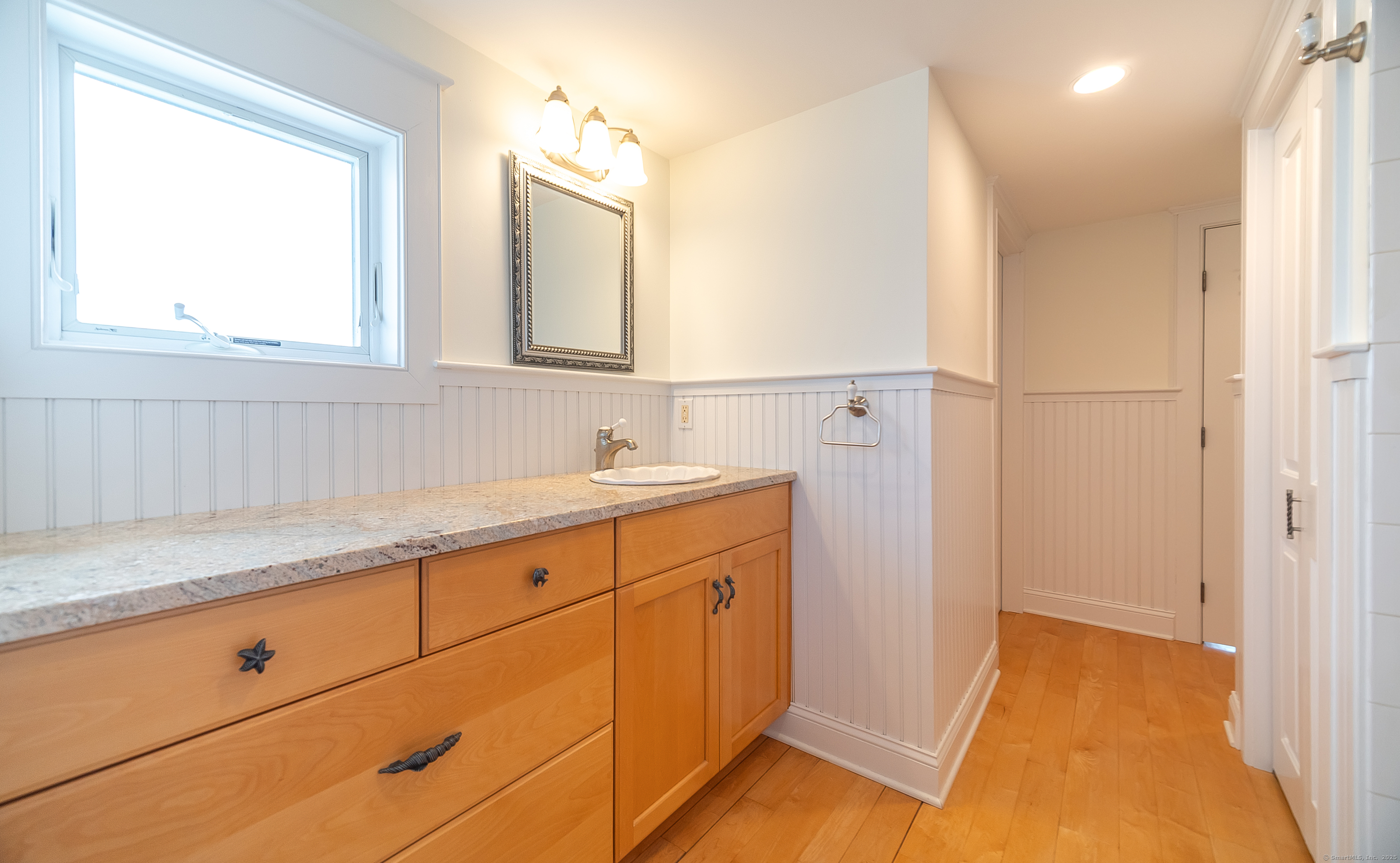 167 Shore Road Clinton, CT 06413 - Photo 36 of 40 Full bathroom on the third floor with a tub-shower.