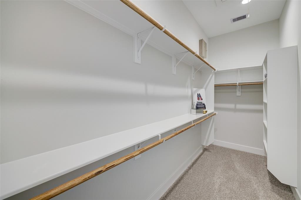 846 Elkhart Street, Unit E Houston, TX 77091 - Photo 14 of 24 a hallway with cabinets